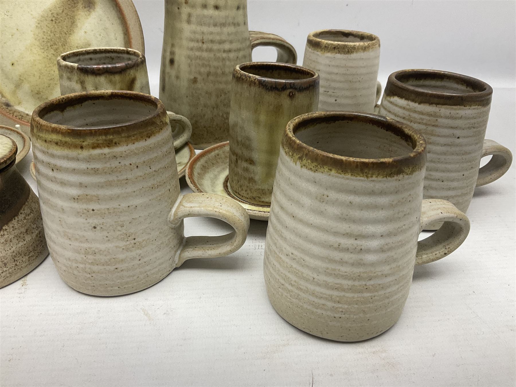 1970s Anchor studio pottery St Ives part coffee service by John Buchanan, all with various impressed anchor, St Ives and other marks, together with similar set of six studio pottery cups with impressed RP monogram