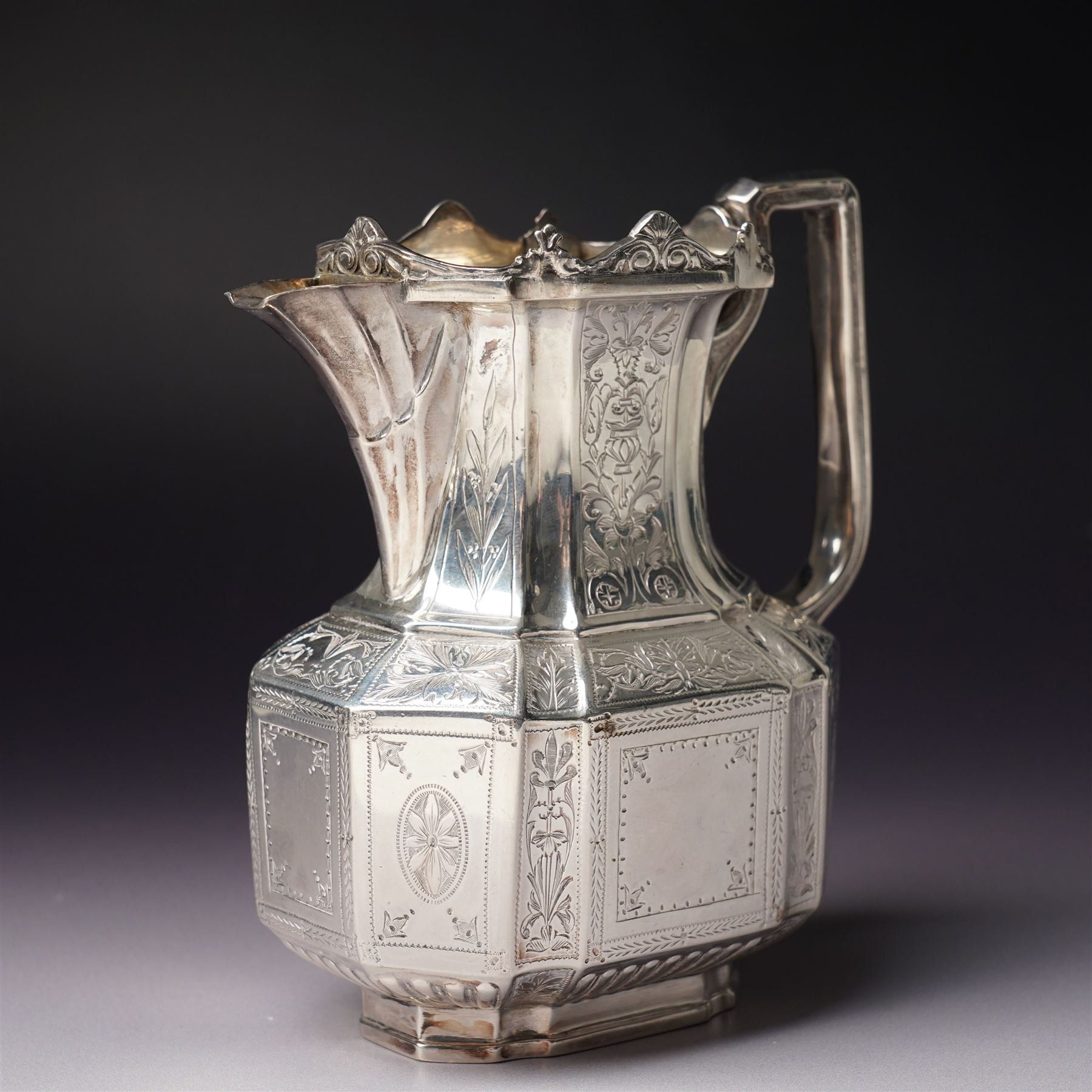 Victorian silver tea and coffee set engraved with classical urns, oval paterae and scrolling foliage, monogram and 'Diligentia et Honore' comprising teapot, tea kettle on spirit heater stand, coffee pot, two handled sugar bowl and cream jug Sheffield 1891 Maker John Round & Son Ltd