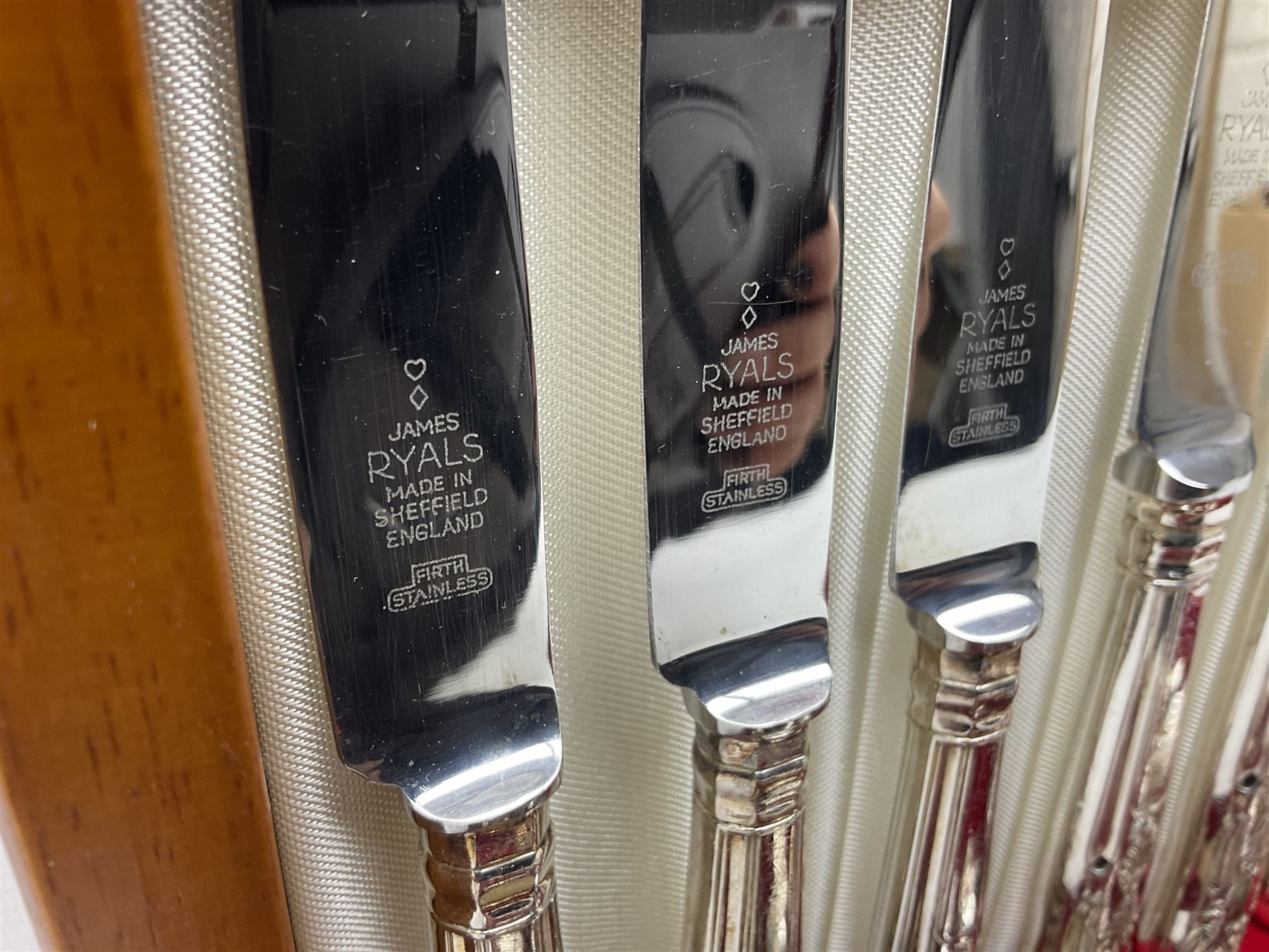 Canteen of King's pattern cutlery for six place settings by James Ryals of Sheffield, with two extra forks, pair of salad servers and six fish knives, all within fitted wooden case, together with six ivorine handled butter knives and six silver plated cake forks