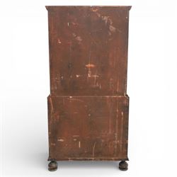 Early 20th century Queen Anne revival walnut chest on chest, the shaped cornice over an arrangement of four long drawers above three further long drawers, figured walnut veneers with feather banding and crossbanding, on turned bun supports