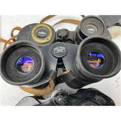 Twelve pairs of binoculars to include BWCF 7x35 Extra Wide Angle, Carl Zeiss Jena Delturis 8x24, Carl Zeiss Jena Jenoptem 8x30W, Chinon Countryman 10x50,  Ajax 8x30, Regent 16x50, etc,  some with cases
