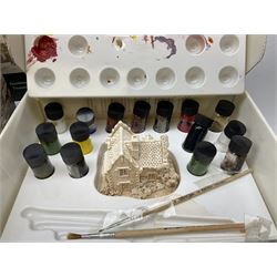 Ten Lilliput Lane models from the 'Paint Your Own' collection, to include cottages and plaques, all boxed, to include one boxed model with paints and brushes and a further box of paints
