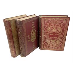 Three late 19th century leather bound books containing religious text on Sainte Vierge, Jesus Christ and Sainte Cecile , decorated with gilt scrolling detail, containing coloured plates in each volume