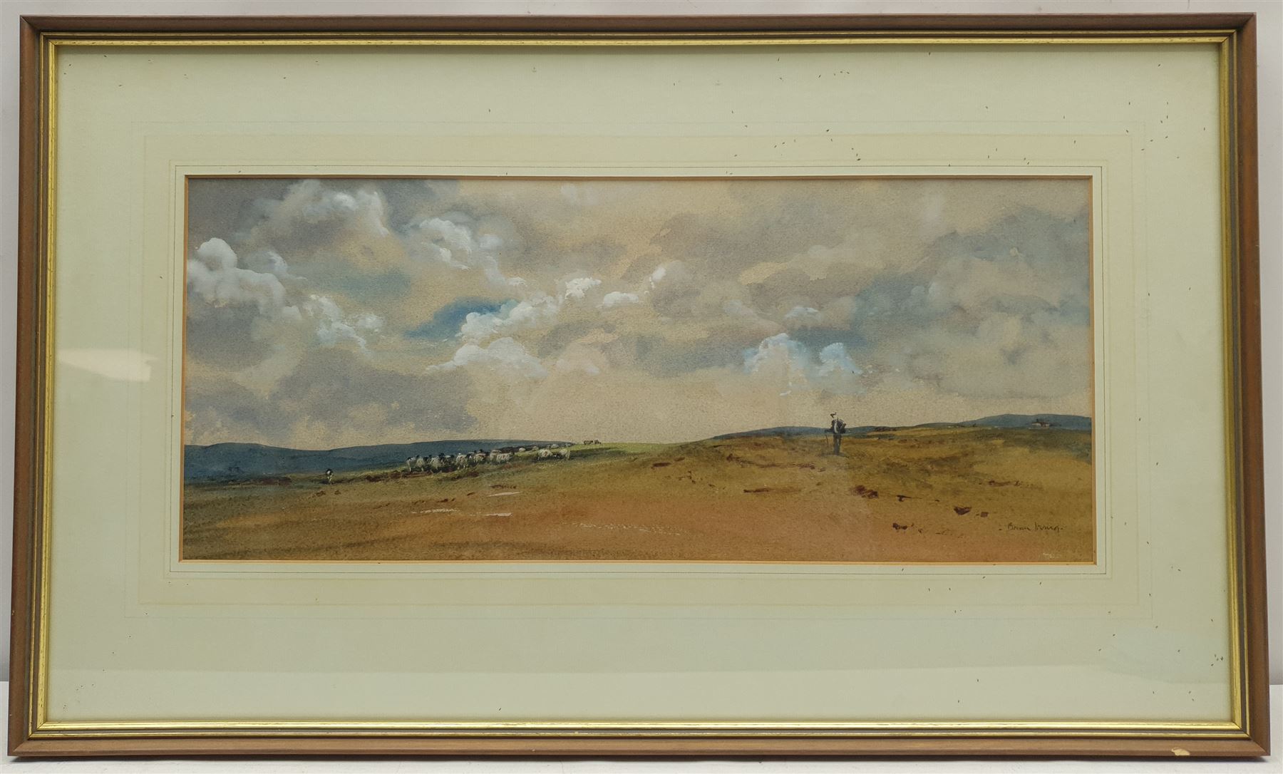 Brian Irving (British 1931-2013): Herding Sheep on the Yorkshire Dales, watercolour signed 22cmx 50cm