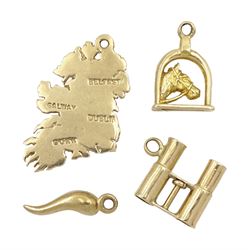 Four 9ct gold pendant/charms including map of Ireland, horse in horseshoe and binoculars