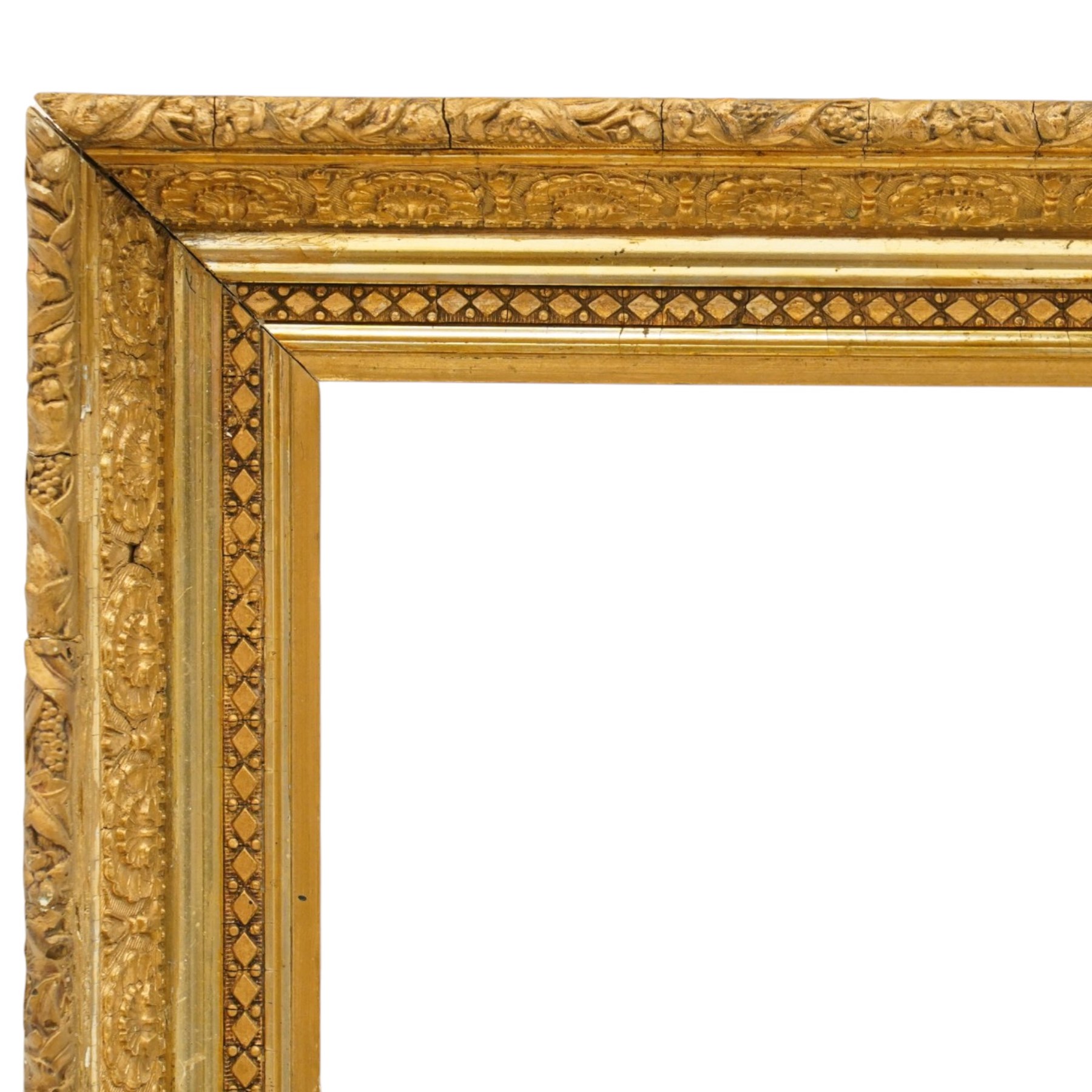 FRAMES - 20th century ornate gilt wood frame, featuring moulded flowers and foliage, aperture 77cm x 51cm, overall 95cm x 68cm