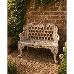 Victorian revival Carron Foundry design heavy cast iron two seat garden bench, scrolled arms with pierced lattice seat, finished in antique white paint
