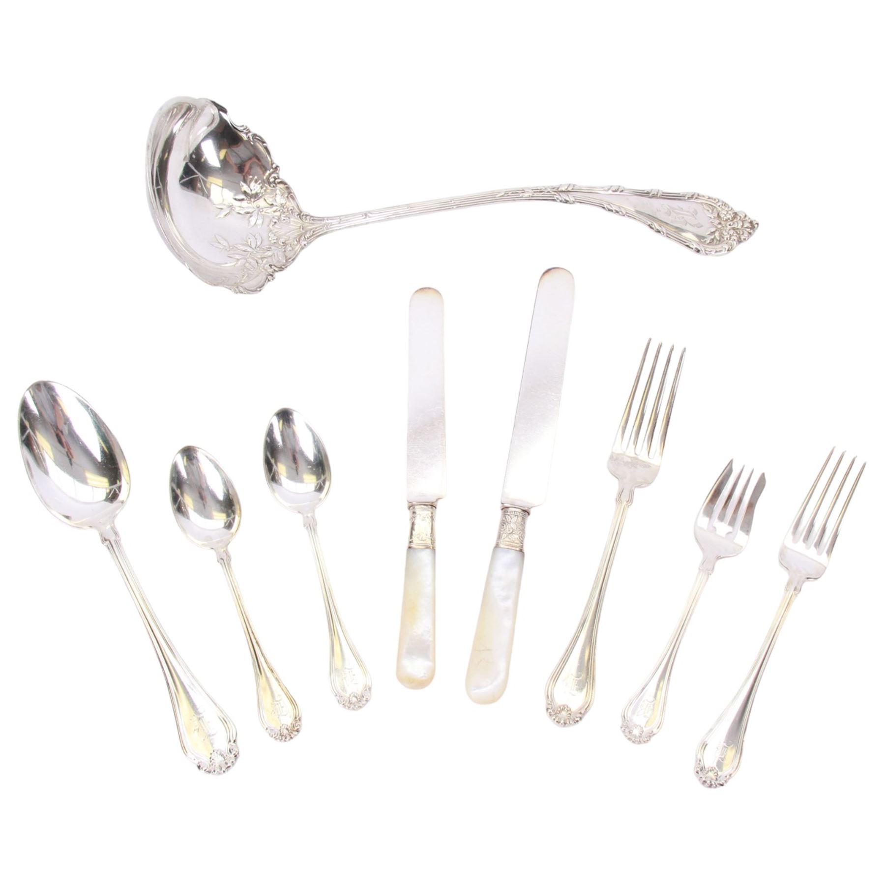 Late 19th/early 20th century American silver Shell & Thread type pattern part canteen, comprising twelve table spoons, twelve table forks, twelve dessert forks, twelve mother of pearl handled butter knives, eleven smaller mother of pearl handled butter knives, eleven teaspoons, twelve pastry forks, six parfait spoons, and large soup ladle, marked for Mermod, Jaccard & Co., St Lois, Missouri, also marked Sterling