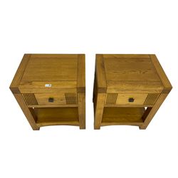Pair oak bedsides or lamp tables, fitted with drawer and undertier