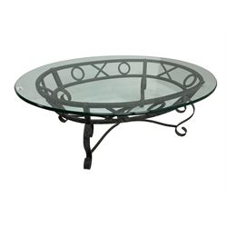 Wrought metal and glass top oval coffee table