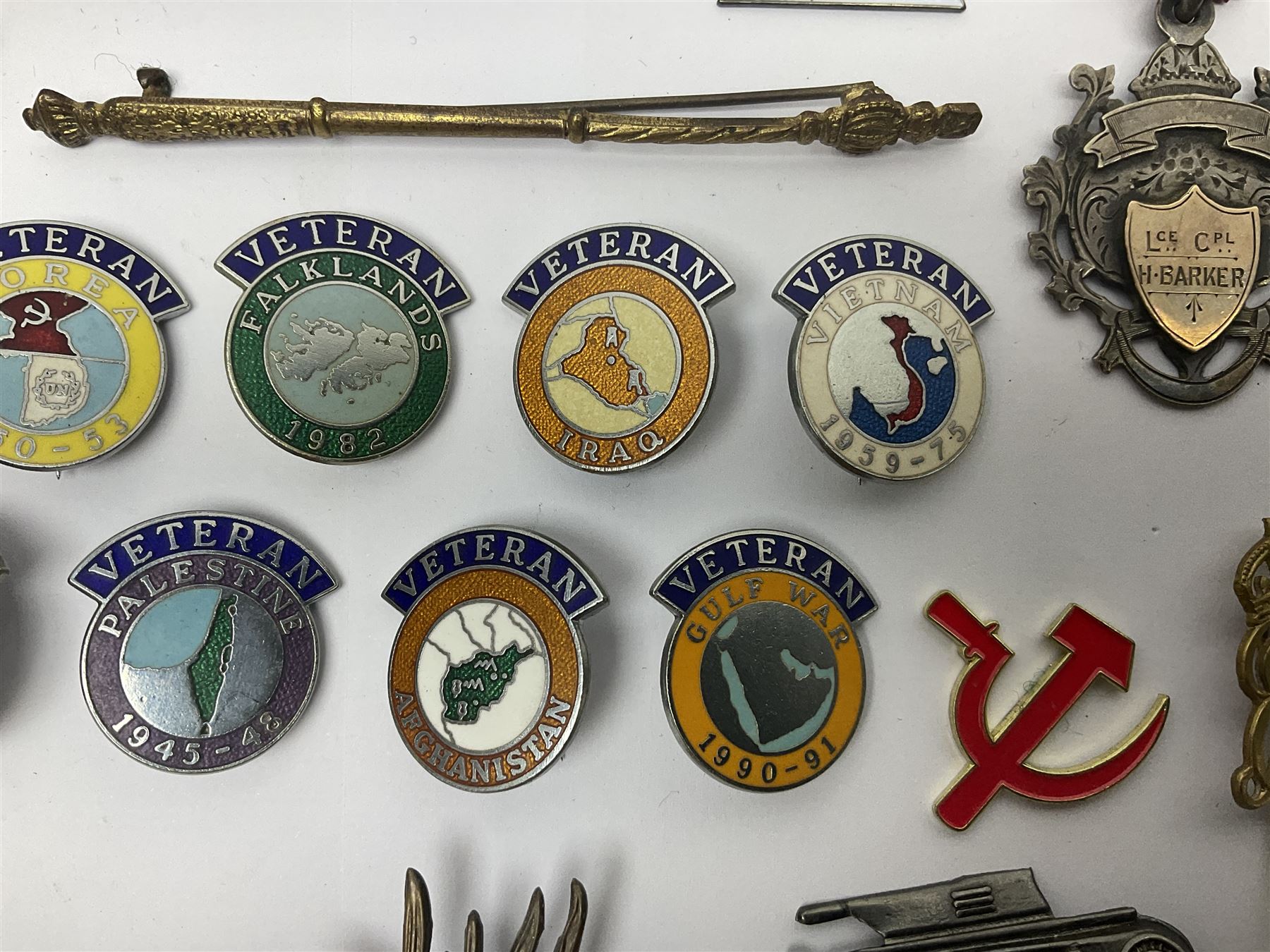 Two Edwardian hallmarked silver presentation fobs for military bugling competitions; and quantity of cap/glengarry and other badges, sweetheart brooches etc