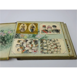  Early 20th century Japanese lacquer postcard album, the cover worked in mother-of-pearl with an eagle, containing postcards from around the world including India, China, Egypt and others on painted silk boards, L35cm x H28cm  
