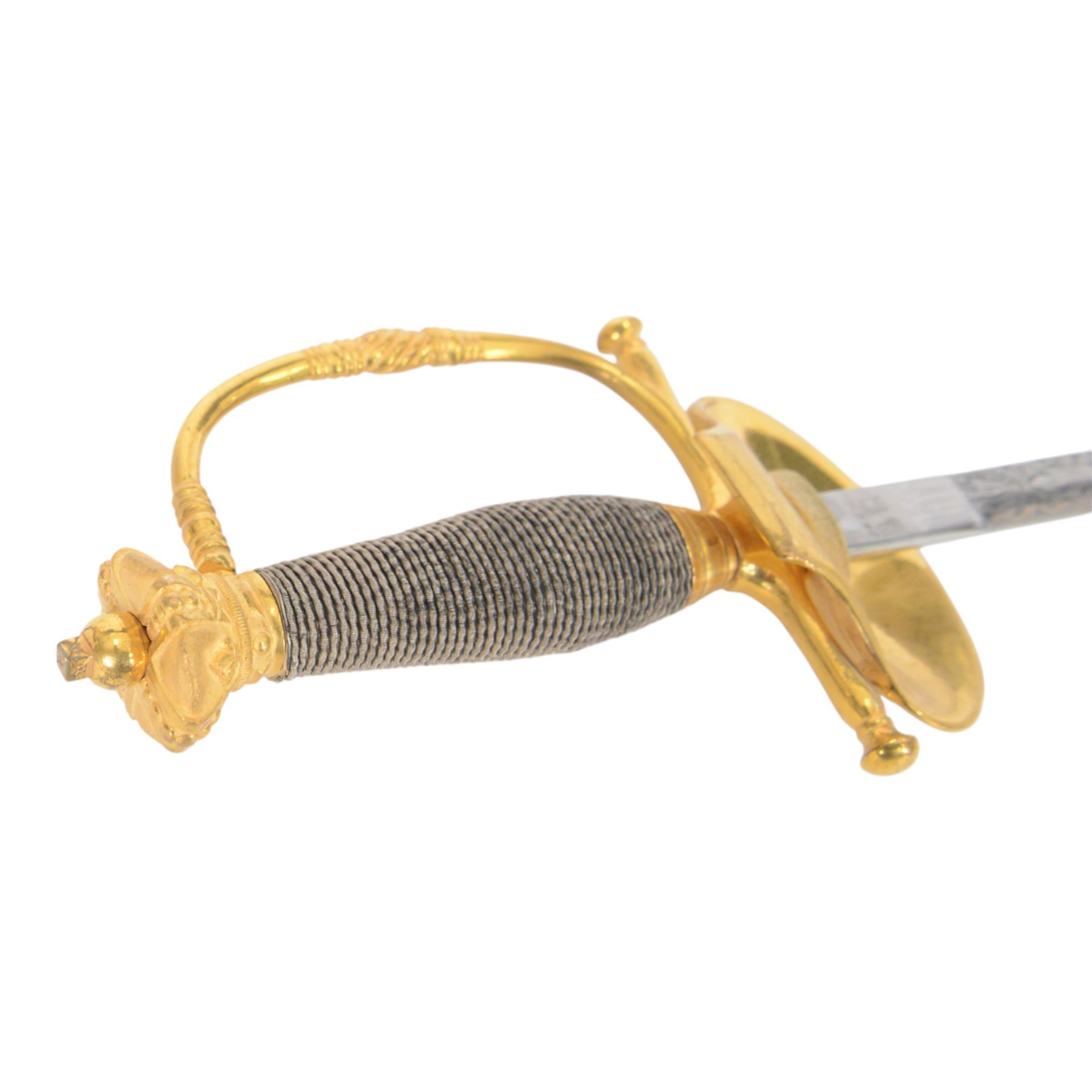 British Victorian court sword, for members of the Royal Household, by W.K & C of Solingen and retailed by Besch of Hanover St London, the 80cm blade etched to both side, the single bar hilt of gilt brass with Queens' crown pommel and downturned shell guard with the monogram of Queen Victoria, the wooden grip covered with silver wire, within leather scabbard with three gilt brass mounts and twin suspension rings, overall L96cm   