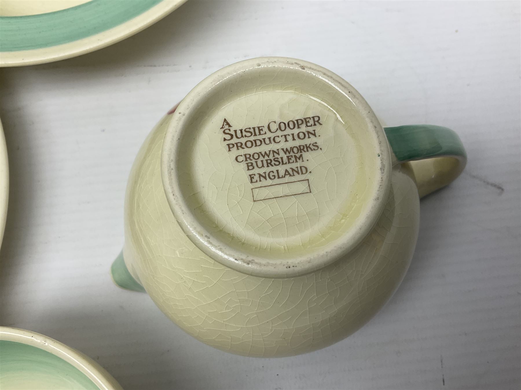 Susie Cooper Dresden Sprays pattern breakfast set, including coffee pot, sugar bowl, milk jug, egg cup, teacup trio and bowl, together with a Susie Cooper Wild Rose pattern coffee service for six