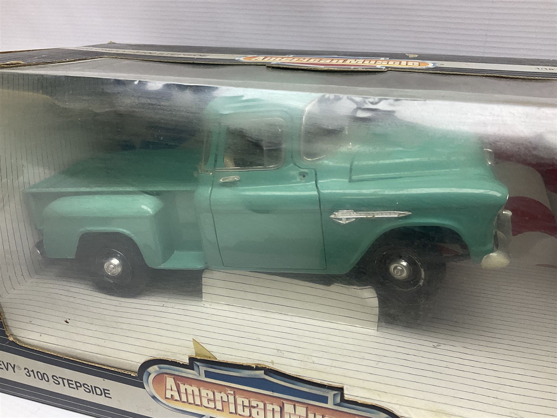 Seven 1:18 scale die-cast models by Ertl, Road legends, Maisto, Solido etc including two Coca Cola promotional vehicles; five boxed (7)