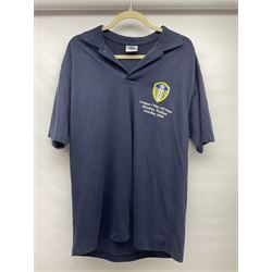 Fourteen items of replica sporting clothing including Leeds United football club shirts, England jerseys etc