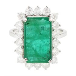 18ct white gold octagonal cut emerald and round brilliant cut diamond cluster ring, stampe...