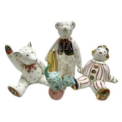 Three Royal Crown Derby figures, comprising Stripy Clown, Mulberry Hall Shopper bear and a seated teddy bear, together with Herend kitten on a ball, largest figures H9cm