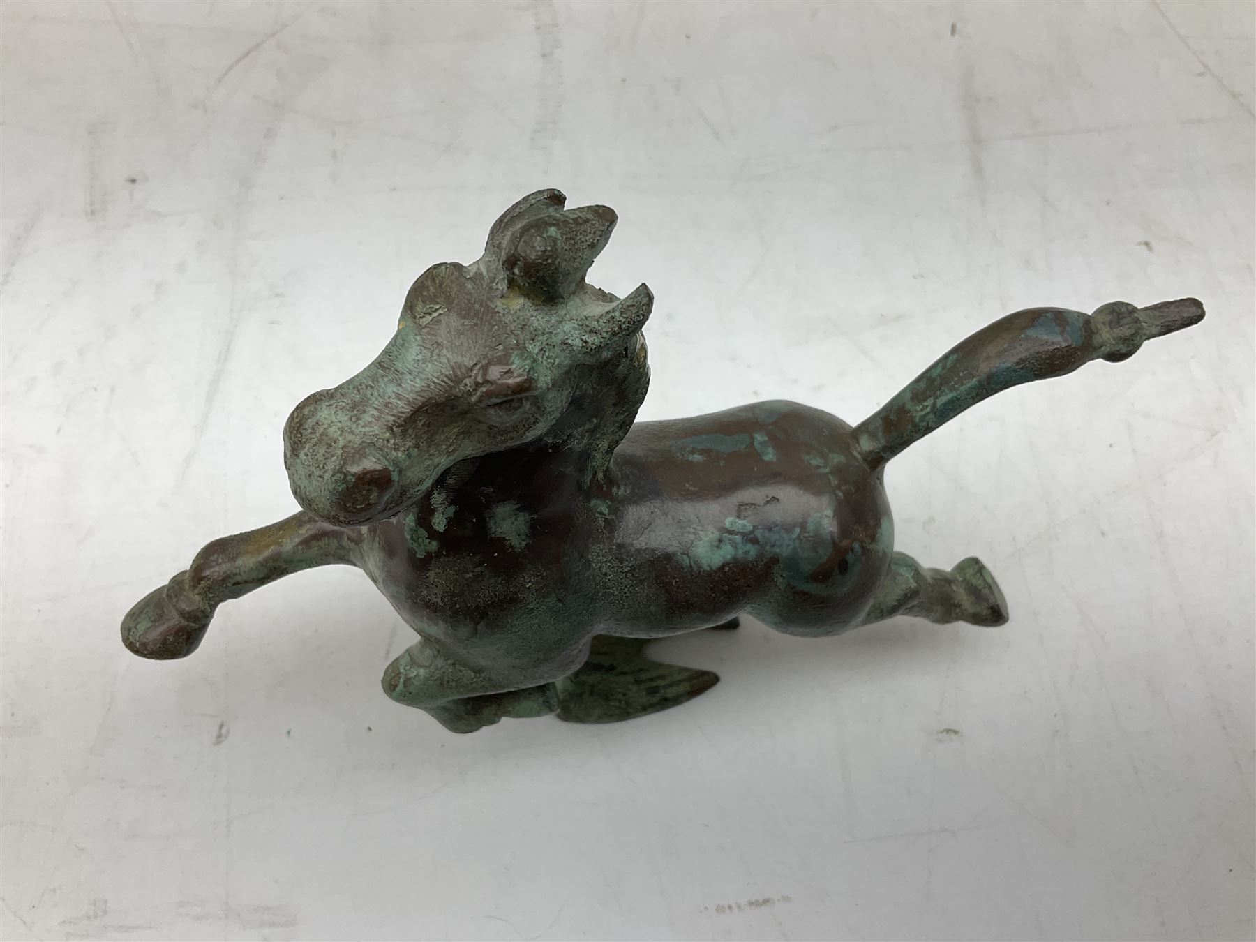 Chinese bronzed Flying Horse of Gansu, modelled upon a flying swallow, H16cm