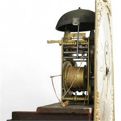 Man Beckett (I) of Stockton on Tees (Co Durham) - 8-day early 18th  century longcase clock in a  profusely carved oak case, with a caddy top, turned finials and attached barley twist pilasters to the break arch hood door, long trunk with carving and a conforming long rectangular door carved with a Celtic depiction of the tree of life, corresponding plinth with a carved and decorative base, break arch brass dial with a rounded brass surround, cast spandrels and silvered boss with the makers name to the arch, matted dial centre with seconds dial, ringed winding apertures, square date aperture and fettled steel hands, silvered chapter with Roman numerals, five minute Arabic's, half hour markers, minute and inner quarter hour tracks, dial pinned to a five pillar movement with inside countwheel striking and a recoil anchor escapement, striking the hours on a bell. With weights and pendulum.
Man Beckett (I), (first name is a biblical name short for Manasseh), was the first member of the Beckett family of prodigious clockmakers working in the North-East of England from 1720 until 1884.