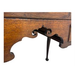 George II oak lowboy, moulded rectangular top over one long and two short drawers fitted with brass drop handles, shaped apron with scrollwork carvings, raised on cabriole supports