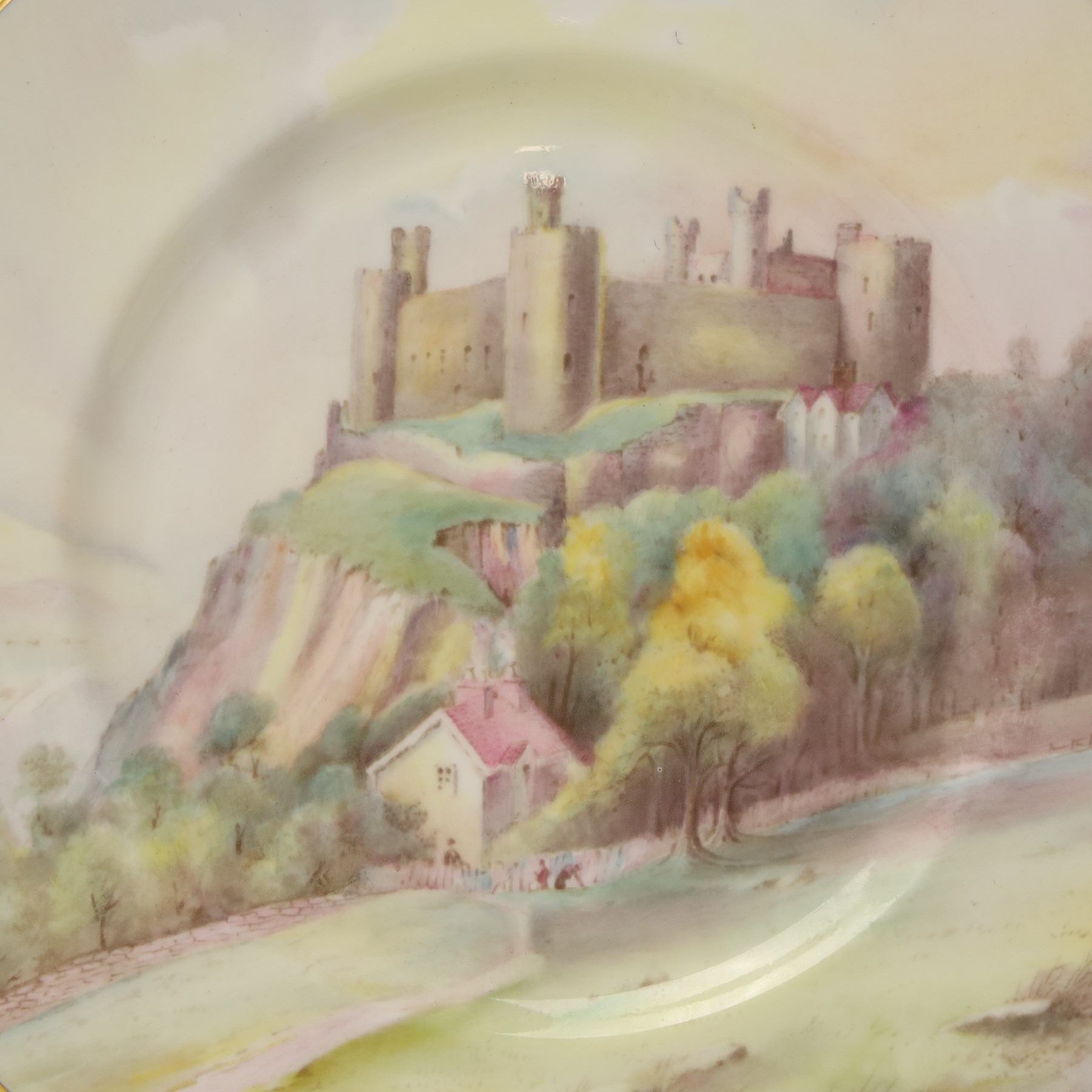 Four Minton hand painted castle plates by J Shaw, depicting 'Harlech Castle - Merionethshire' 'Stirling Castle - Sterlingshire' 'Caernarvon Castle - Caernarvonshire' and 'Arundel Castle - Sussex', with printed marks to base, D27cm (4)