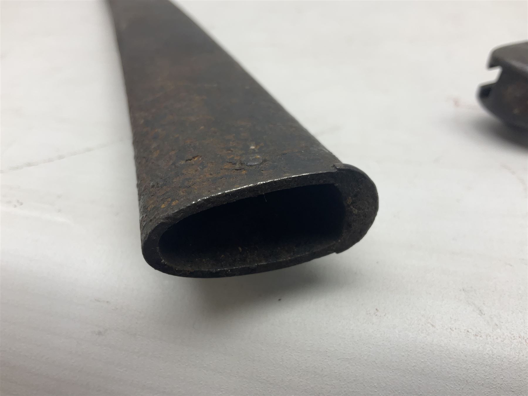 French 1866 pattern sabre bayonet with 57cm fullered steel curving blade dated 1875, in steel scabbard L71cm overall