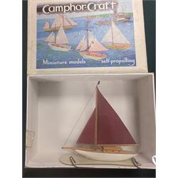 Small collection of model vehicles, including tin-plate trolley bus, Dinky Guy lorry, Triang Pedigree Prams bus, etc