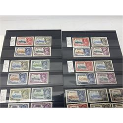 King George V 1910-1935 Silver Jubilee stamps, including Antigua, Basutoland, Cayman Islands, Fiji, Nyasaland, Jamaica, St Helena, Seychelles, Swaziland, St Lucia, British Guiana etc, housed on pages and stockcards 