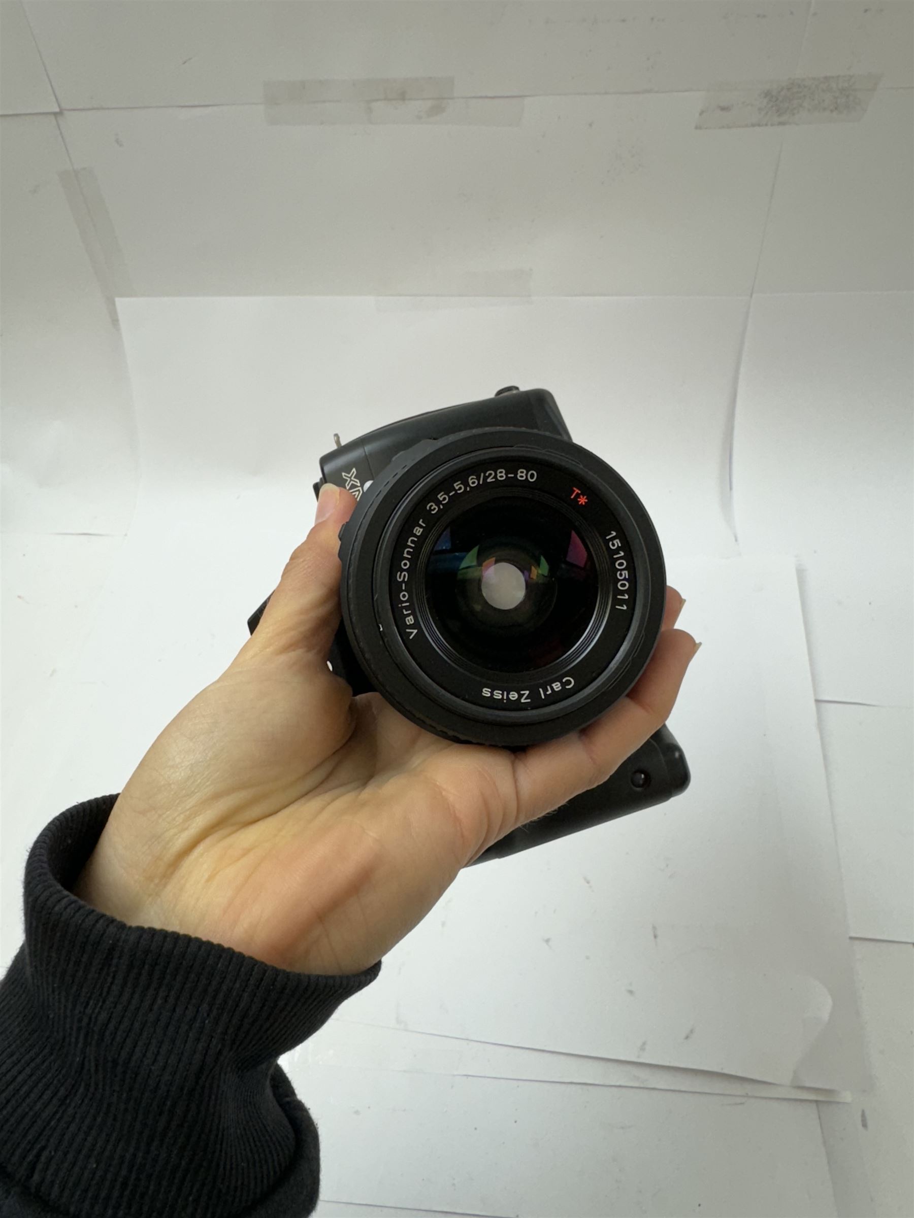 Contax NX SLR camera serial no. 007439, with a Carl Zeiss Vario-Sonnar 3.5-5.6/28-80 T* lens serial no. 15105011