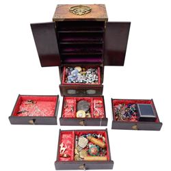 Chinese tabletop greenstone panelled cabinet, with brass mounts, feather pulls, revealing three fitted drawers, each with upholstered cushioned interior containing silver, polished stone and other costume jewellery