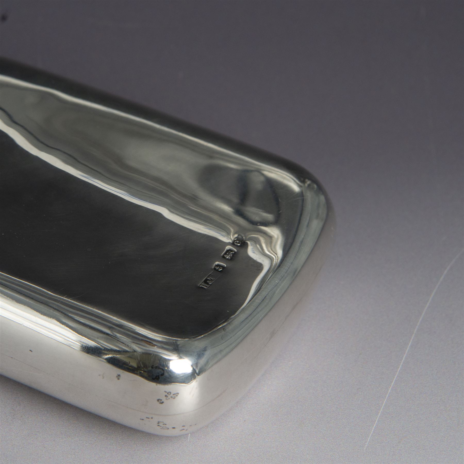 Edwardian silver hip flask, of slightly curved rectangular form, with silver body, hinged cap and removable silver cup, the cup with presentation engraving and gilt interior, hallmarked Hilliard & Thomason, Birmingham 1904, H17cm