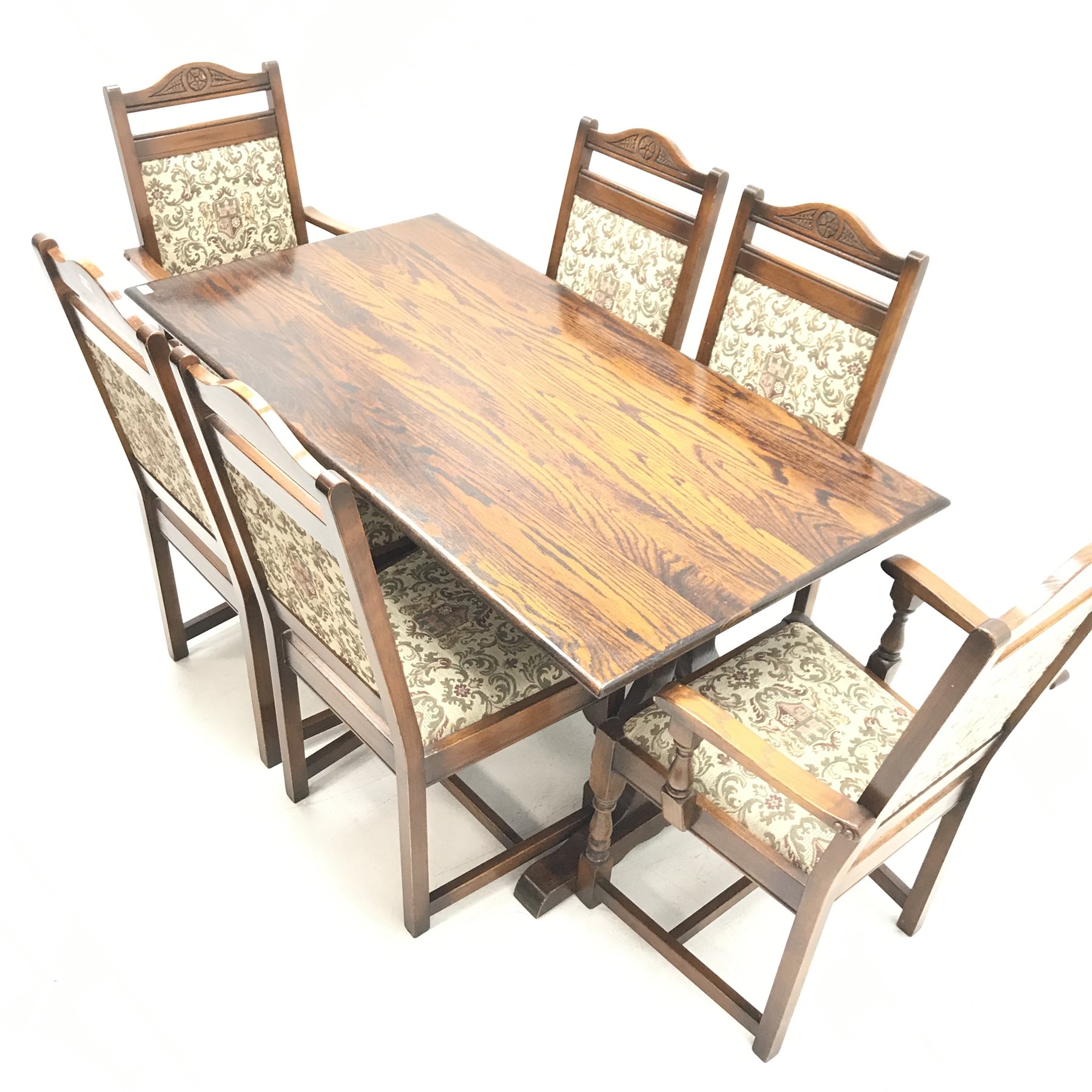 Old Charm - refectory style rectangular oak dining table, shaped and pierced end supports joined by stretcher on sledge feet (W153cm, H76cm, D82cm) and set six (4+2) oak framed dining chairs, carved and shaped cresting rail, upholstered splat and seat, baluster supports (W58cm)