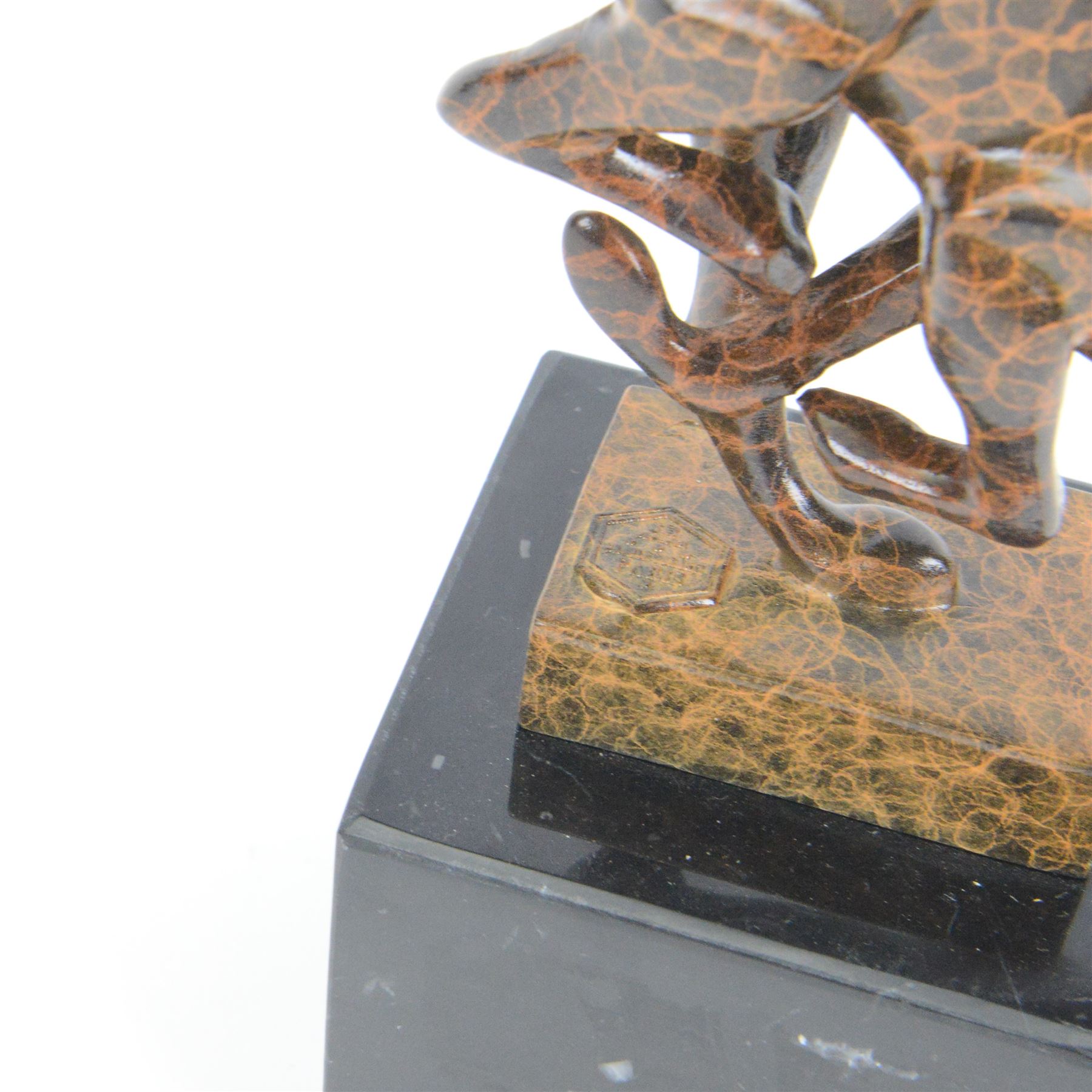 Bronze two toned figure of running cheetah, upon a rectangular marble base, signed and with foundry mark, H20cm 