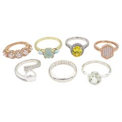 Six silver and silver-gilt stone set rings and a silver wedding band, all stamped 925