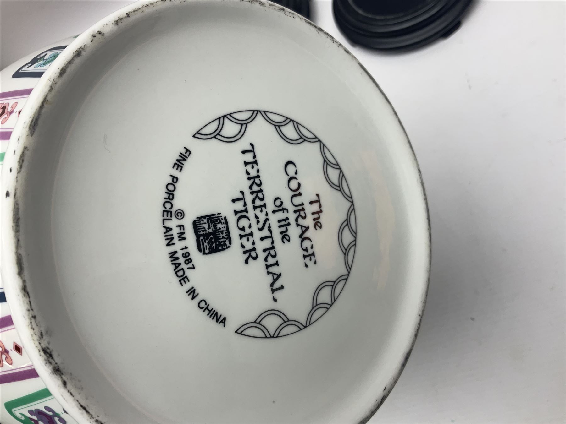 Franklin Mint Chinese style ceramics, comprising two vases, puppy and a planter, all on wooden stands