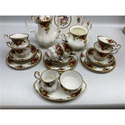 Royal Albert Old Country Roses pattern tea service for six, comprising teapot, hot water pot, seven teacups, six saucers, six side plates, twin handled dish and jug and a Lady Carlyle cake plate
