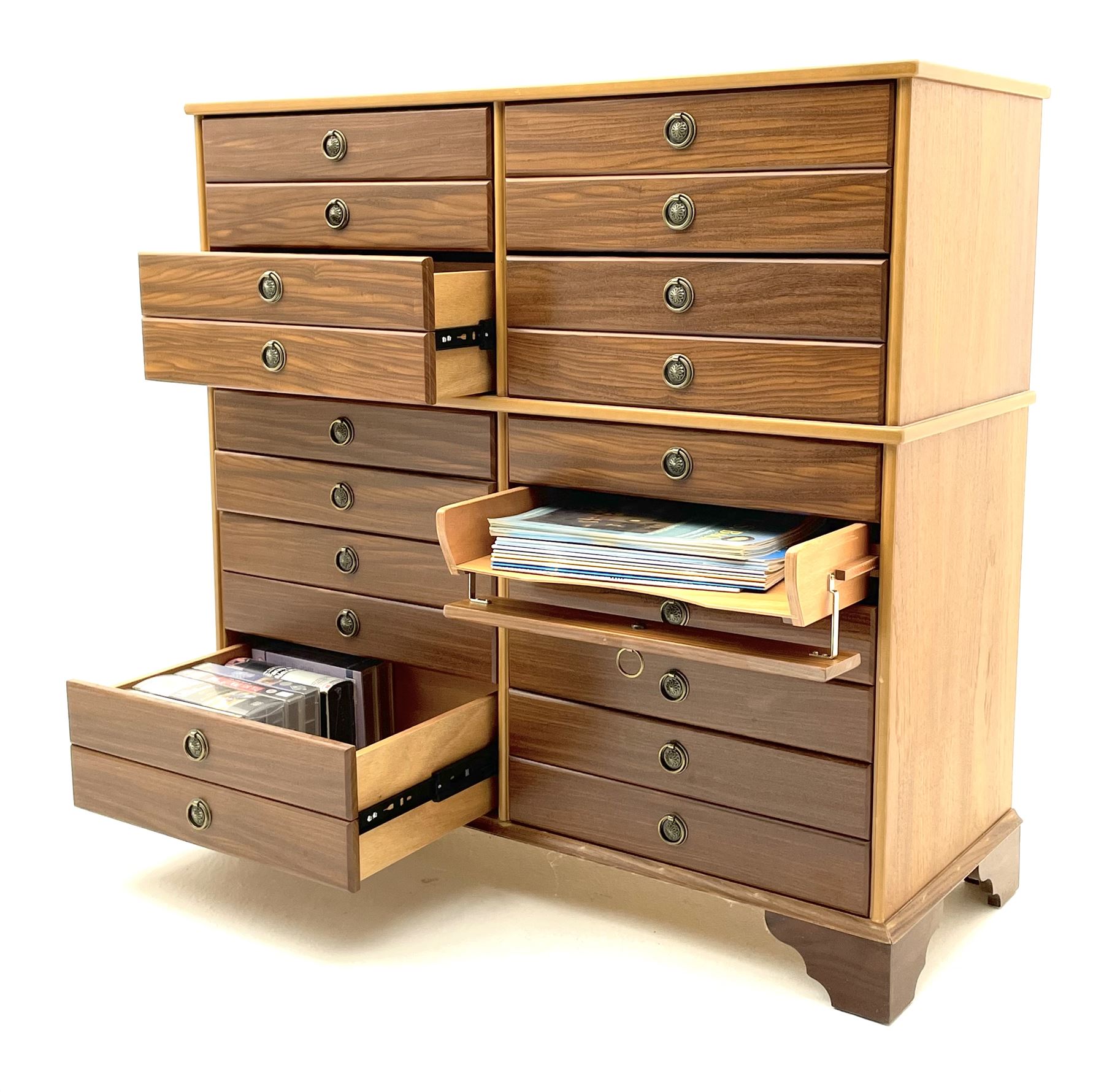 Teak multi-drawer music chest, fitted with eight drawers and four manuscript drawers with fall fronts, with contents