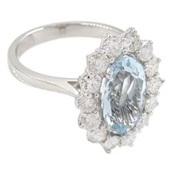 18ct white gold oval aquamarine and round brilliant cut diamond cluster ring, hallmarked, aquamarine approx 2.45 carat, total diamond weight approx 1.20 carat