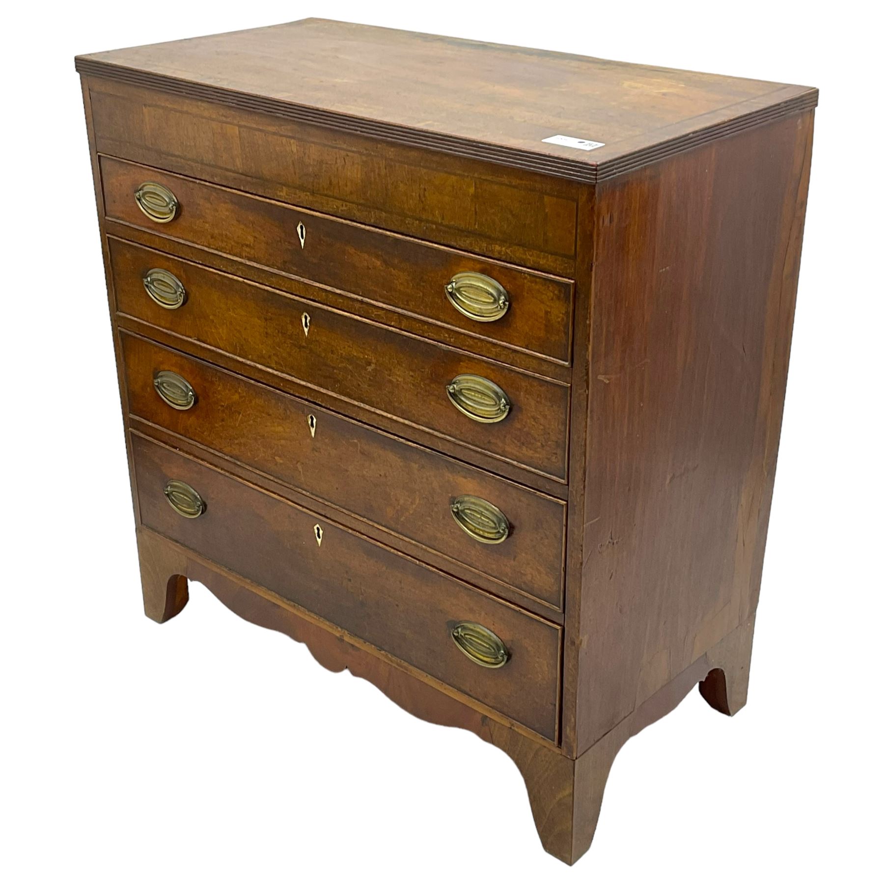 George III mahogany chest, rectangular crossbanded top over four long cock-beaded drawers with bone lozenge escutcheons and oval pressed brass handle plates, on bracket feet