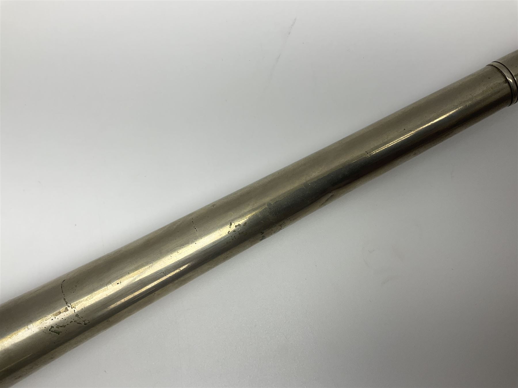 19th century telescopic hunting horn, the bell engraved 'The Beaufort', with makers mark Kohler & Son, makers, 61 Victoria Street, Westminster (from Covent garden) London, in a leather sheath, horn full extended L91cm 