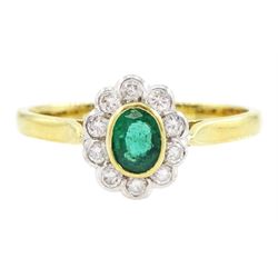 18ct gold emerald and diamond cluster ring, single oval cut emerald of approx 0.25 carat, ...
