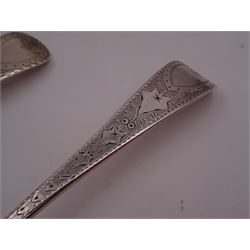 George IV silver fruit serving spoon, the bowl embossed with fruits, with engraved vine leaf decoration to handle, hallmarked London 1789, together with a very similar earlier example, hallmarks worn and indistinct