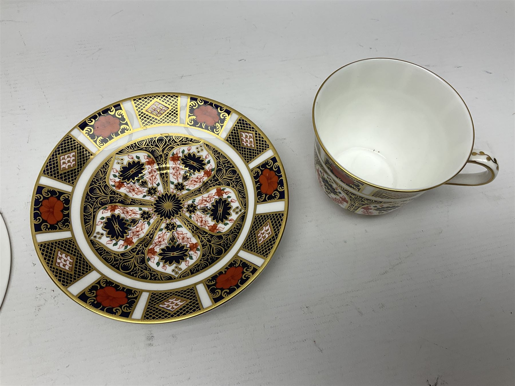 Royal Crown Derby 1128 Imari pattern two coffee cans and saucers