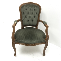 French style walnut framed armchair, carved shaped cresting rail, buttoned upholstered back seat and arms, cabriole legs, W64cm
