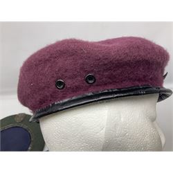 Four paratrooper berets - Russian, Italian, British and Foreign Legion; all with badges (4)