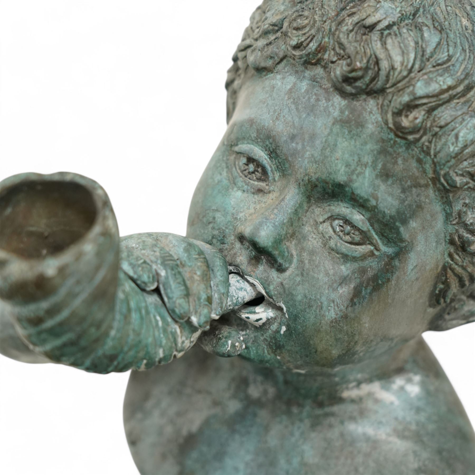 Cast bronze garden water fountain in the form of three Putti on circular naturalistic base, stamped 'Leonardo Rossi'  