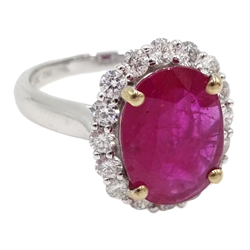  18ct white gold oval ruby and diamond cluster ring, stamped 750, ruby approx 3.80 carat, diamond total weight 0.81 carat  
[image code: 4mc]