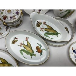 Royal Worcester Evesham pattern, including covered pot de cremes, twin handle tureen, serving dishes, flan dishes, side plates etc  
