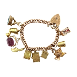 9ct gold curb link chain bracelet, with heart padlock, eight 9ct gold charms including swivel fob, book and first aid and two 14ct citrine and  clog charms, all hallmarked or tested, approx 42.1gm 